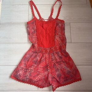 Free People multi colored Romper Size Small with Lace up back